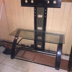 Black metal Tv stand wit glass shelf