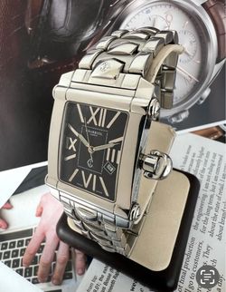 Charriol Colvmbvs (Columbus) reference CCSTRX9 is a luxury Swiss wristwatch featuring a rectangular stainless steel case, reliable quartz movement, an