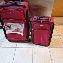 New 17x28  and 14x20  TAG Suitcase set