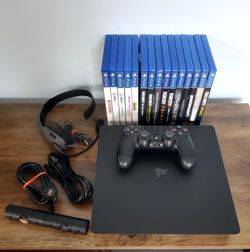 Sony PlayStation 4 Gaming Console +Sony PlayStation Camera+Sony Dual Shock Controller+Wired headset+15 games