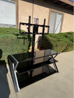 Tv stand with tv mount attached