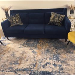 Blue Velvet Couch, Bar Stools, and yellow living room chairs