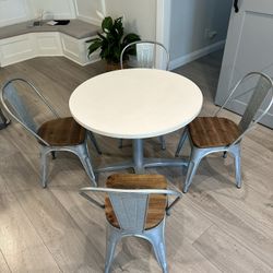 (1) White Kitchen Table With Metal Base And (4) Metal/Wood Chairs.