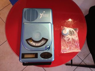 Blue Hamilton Buhl HACX-205 portable classroom CD and MP3 player.
It features a top-loading design for CD/CD-R/CD-RW discs and includes a USB port for