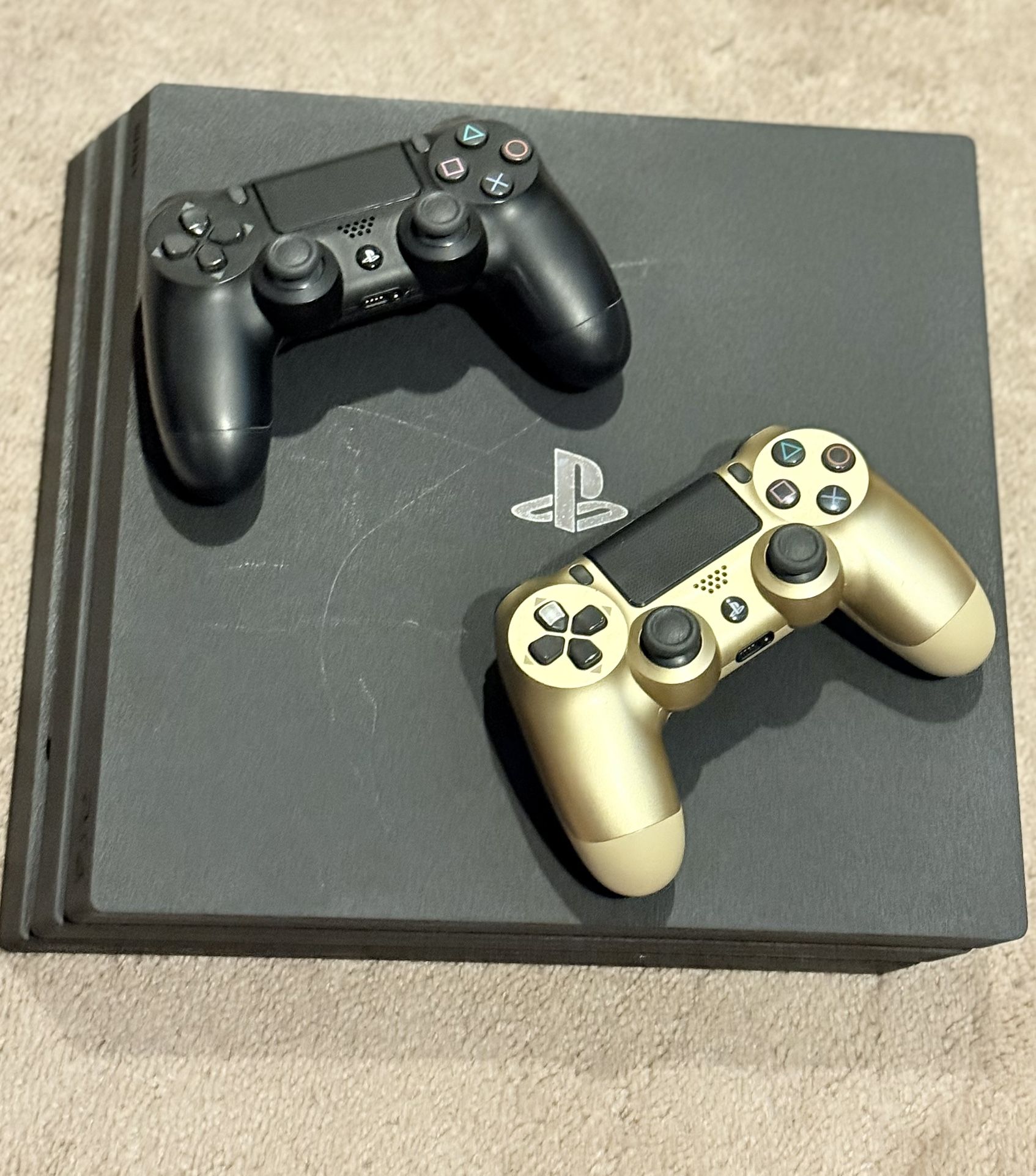 PS4 Pro (1 TB) - comes with 2 controllers