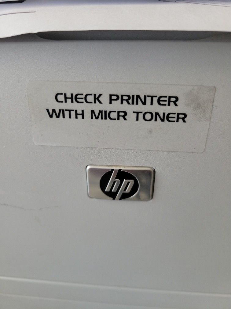 CHECK PRINTER WITH MAGNETIC TONER