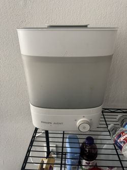 Bottle sterilizer/dryer and Bottle warmer
