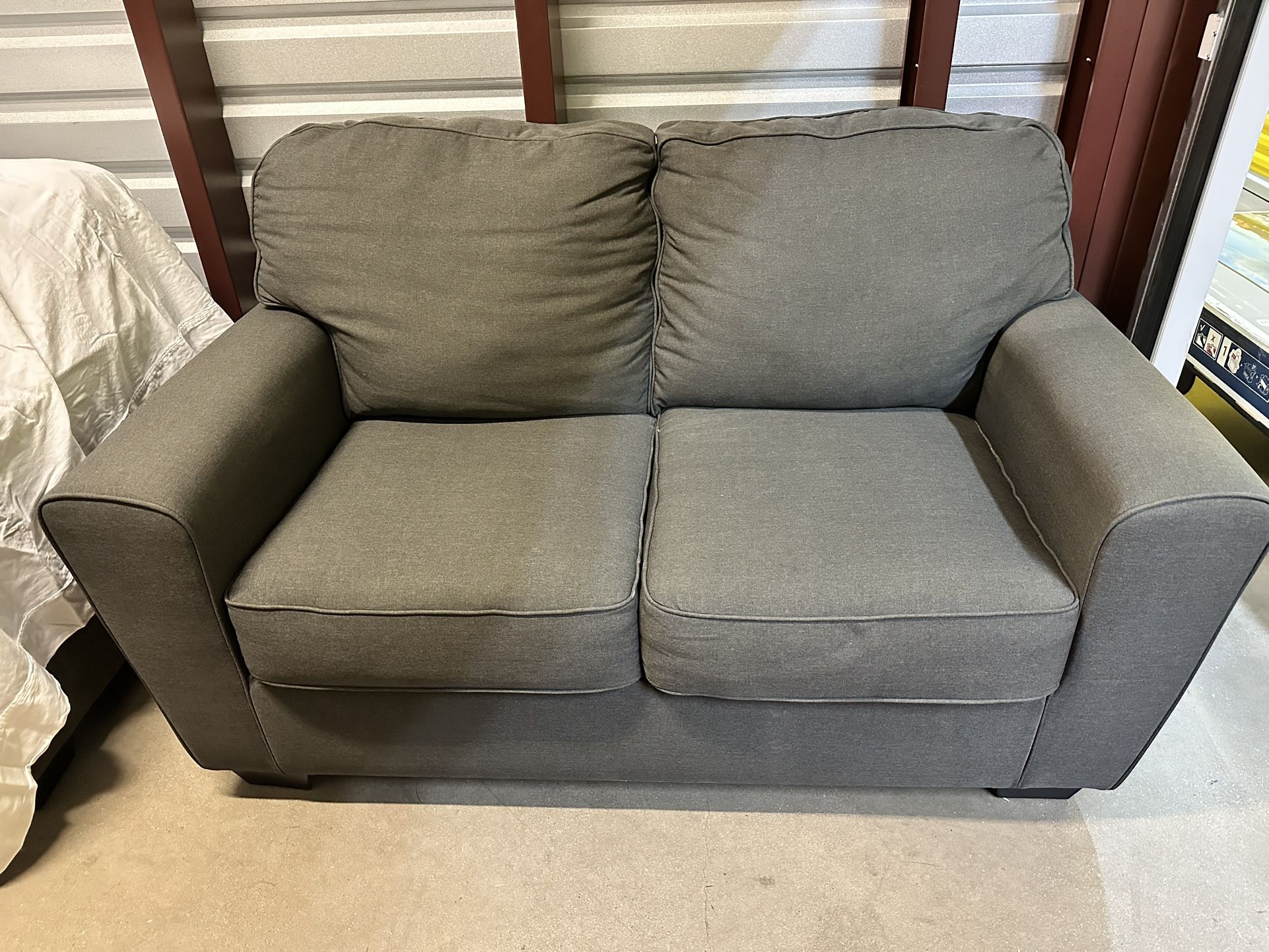 Living Spaces Graphite Love Seat Couch