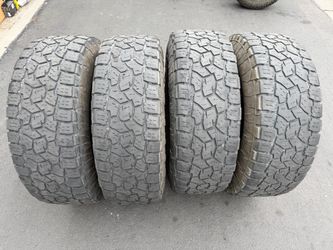 (4) 37x12.50R18 Toyo Open Country A/T III Tires