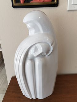 Vintage Haeger Pottery "Lovers Embrace" 6051 sculpture in a glossy white finish.
