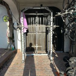 Full squat rack, bench, accessories, and weights
