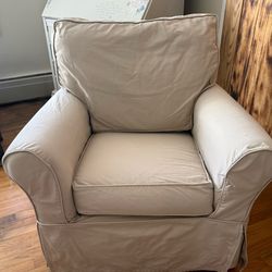 IKEA beige swivel rocker with ottoman