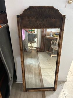 Wall Mirror with Carved Quote on Top “The Fears We Feed Today Starve Our Joys If Tomorrow “