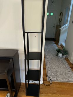 Floor lamp with shelves