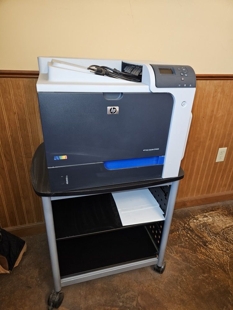 HP Color Laser Jet CP4025 PRINTER and stand