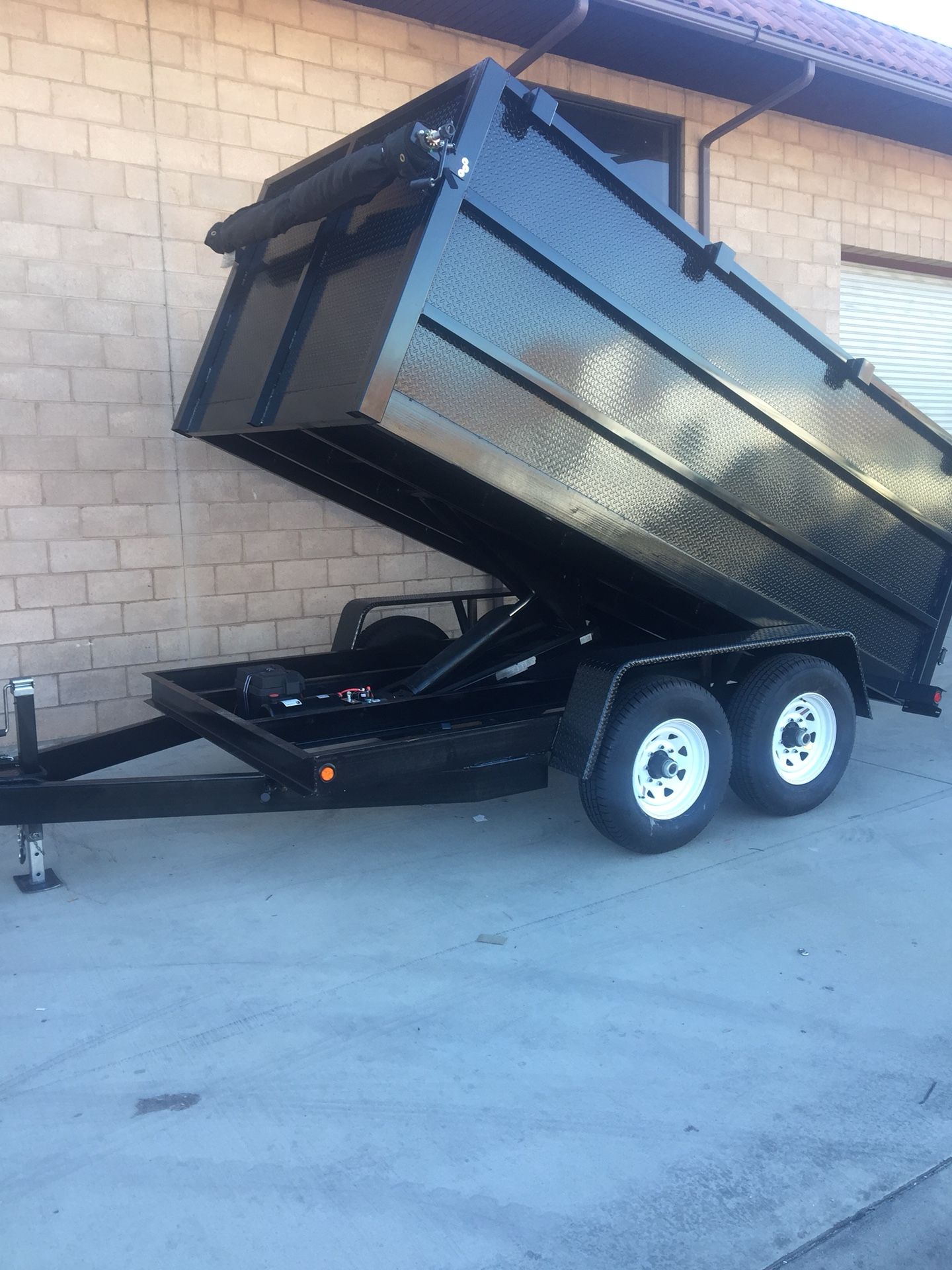 Brand new 8x12x4 HD dump trailer