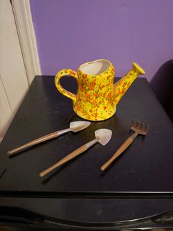 Ceramic watering can
