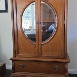 Beautiful Oak Armoire With Carved Accents, $425