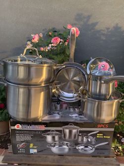 Set de 9ps De acero inoxidable. Con tapaderas de vidrio