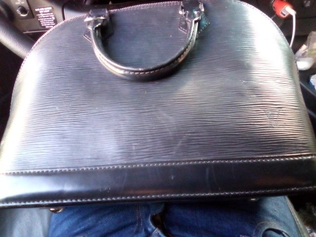Louis Vuitton ALMA epi Leather Bag