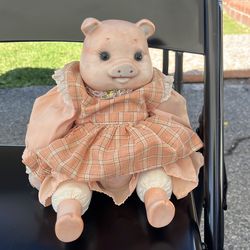 Porcelain pig doll