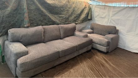 Very comfy gray couch with matching oversized chair great condition clean we sell all the time delivery $40 local