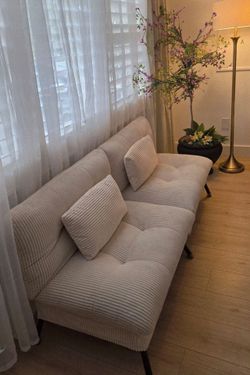 Modern and very comfortable living room furniture in minimalist style with two cushions