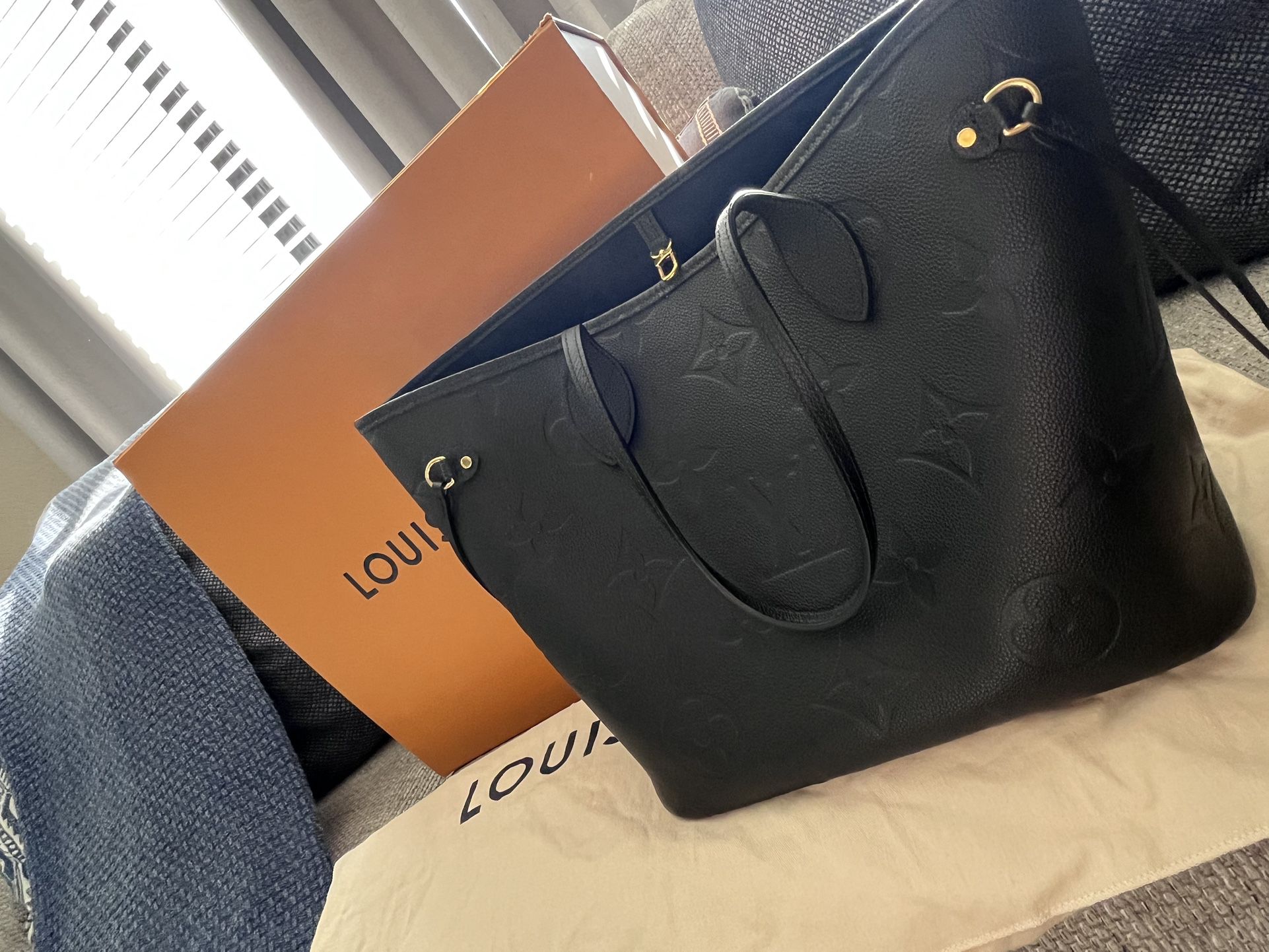 Selling my LV bag used but in new condition
