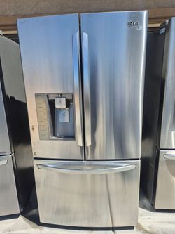 Lg French Door Refrigerator With Water And Ice Dispenser