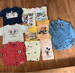 Ladies Disney apparel. T shirts, 2 crop tops, one classic red & white polka dot short sleeve shirt, and one long sleeve shirt