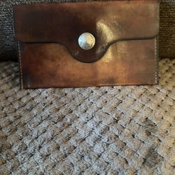 A vintage leather wallet from 1934.