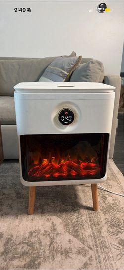 Towel/blanket warmer with fireplace display