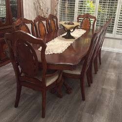 Dining table with eight seats, and a matching China 