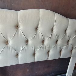 Queen tufted headboard with tear on side