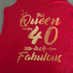 Red tank top. Has a gold graphic that says 'This Queen makes 40 look Fabulous'. Size Medium.