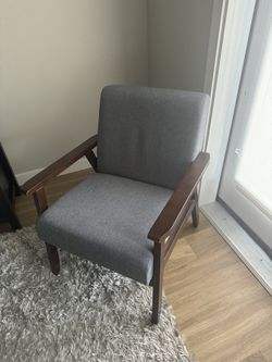 MID CENTURY MODERN ACCENT CHAIR.