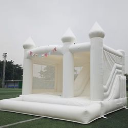 White Bounce house with slide