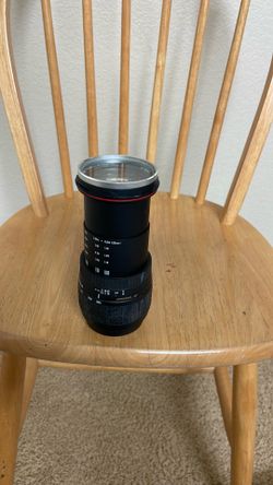 ASPHERICAL IF 28-300mm f/3.5-6.3 DG Macro lens is designed for versatility, covering focal lengths from wide-angle to telephoto.
