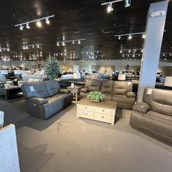 Grey Power Reclining Couch And Loveseat