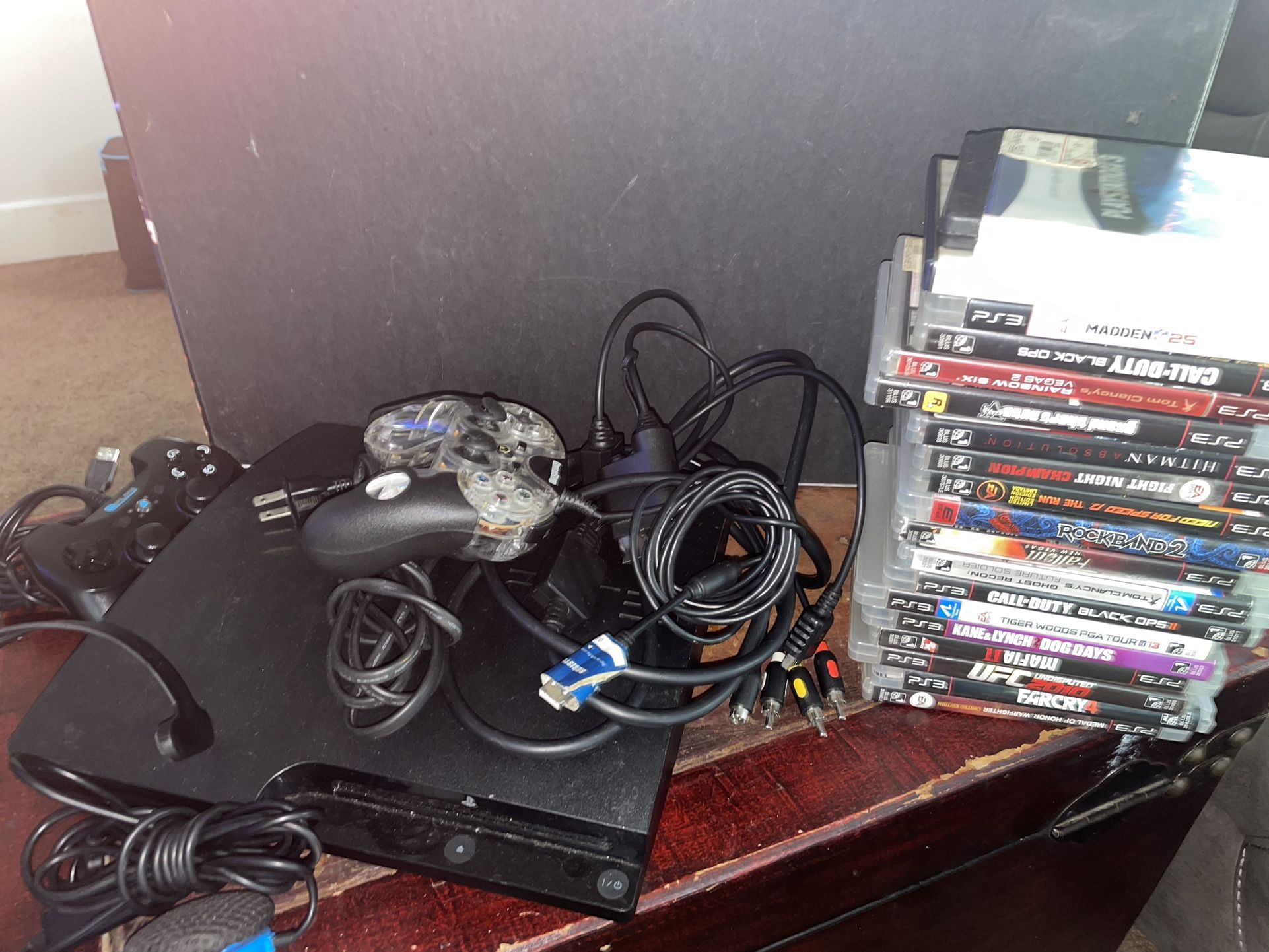 ps3 With 2 Controllers Games And Microphones