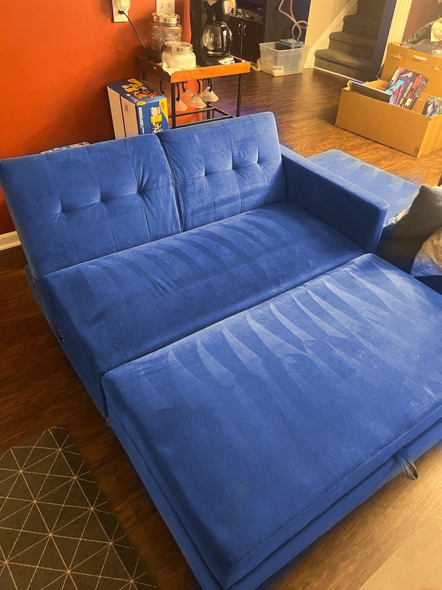 Blue storage couch and ottoman