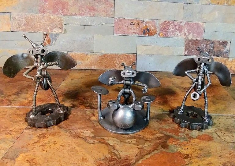 Metal Art Decor • 3- Lot Ant Musicians • 1- Drummer • 1- Saxophone Player • 1-  Trumpet Player • Created From Nuts & Bolts .

B-2 