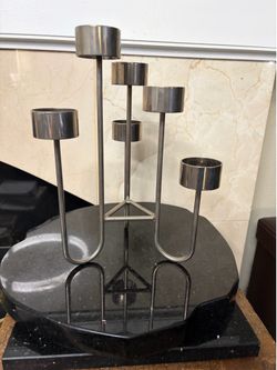 Stained steel candelabra is a 1990s postmodern Danish design