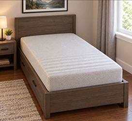 8" thick twin mattress with cover.