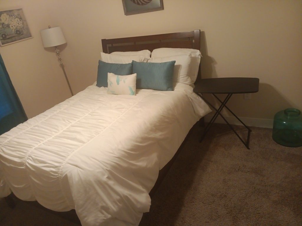 Full size bed with frame, box spring and mattress only.
