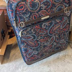 Chaps 4 piece rolling luggage set