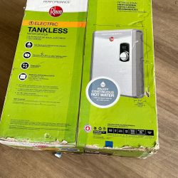 Them Water Heaters. Tankless. Model RETEX -18. New 