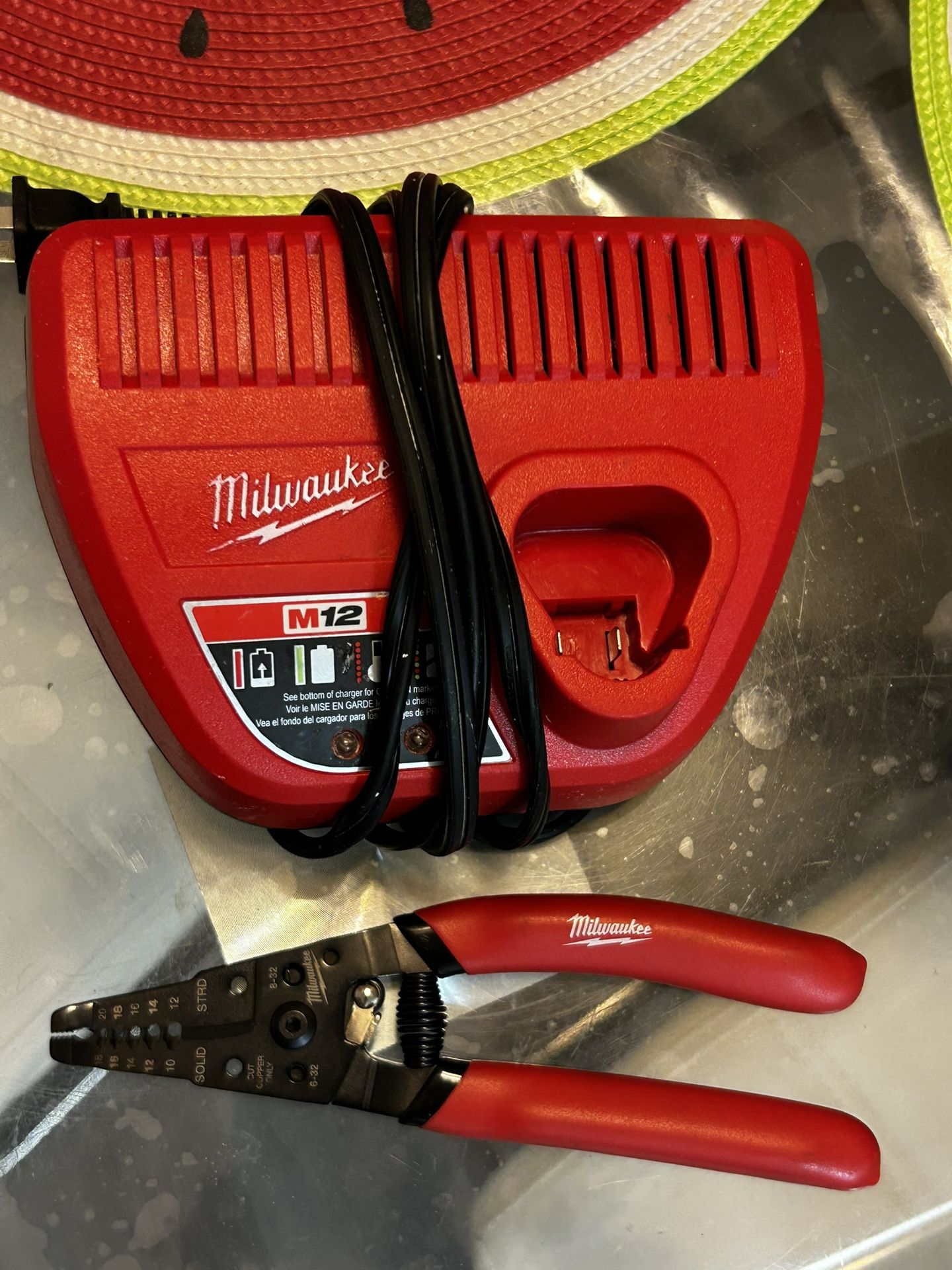 MILWAKEE M12  Charger And Crimper Pliers.  $25. Firm Price 
