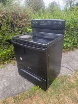 Amana Black Electric Range with Glass Cooktop about 2 years old