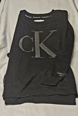 Calvin Klein Jeans Sweatshort With Silver Sequins.